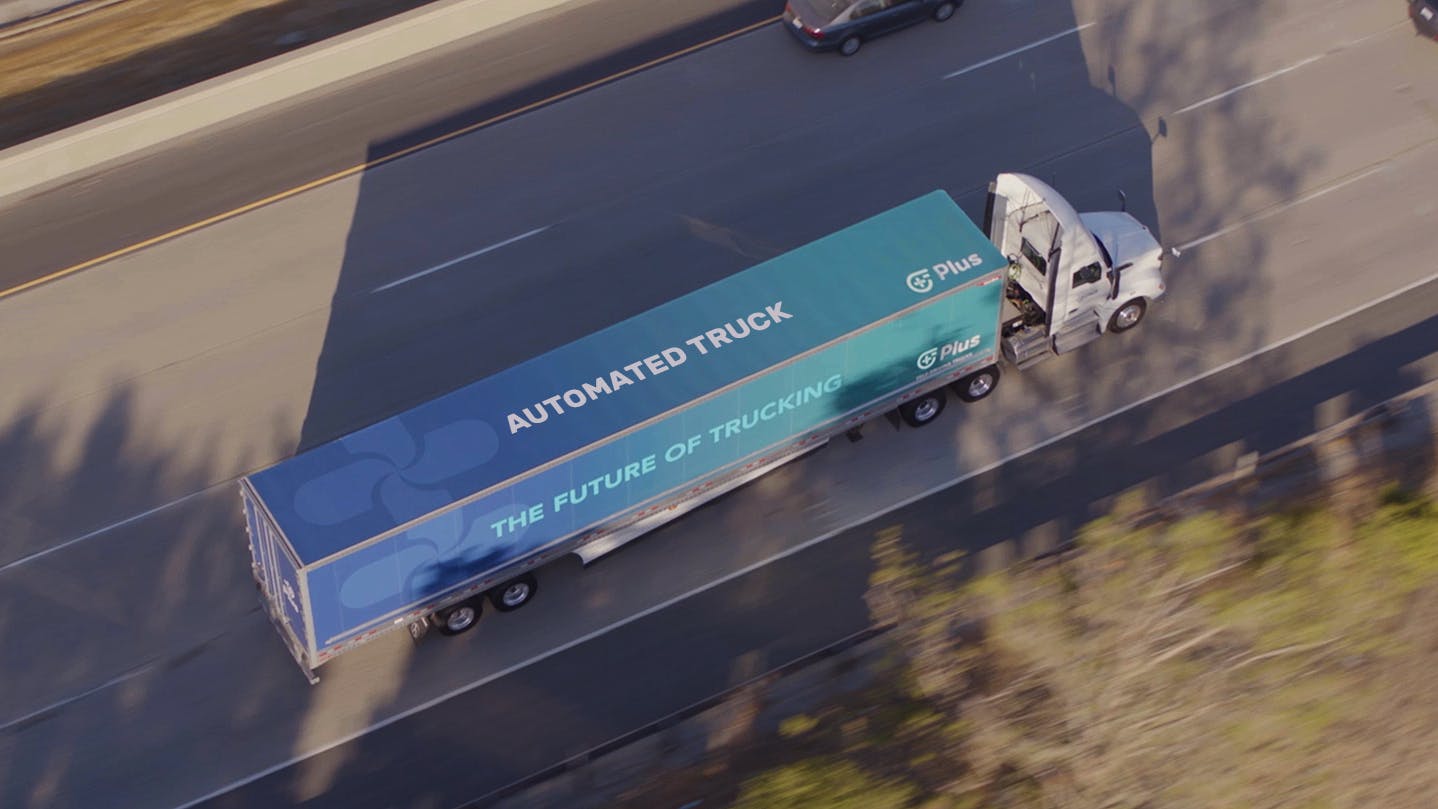 Aerial view of Plus automated truck on highway